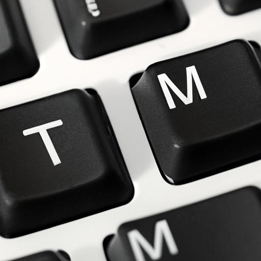 Definition of TM - A keyboard with 'TM' key